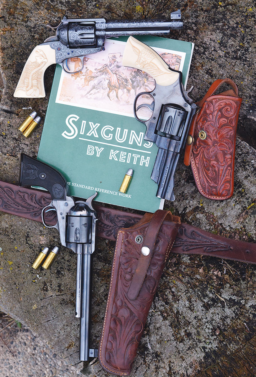 Keith primarily used custom Colt SAAs (top  and bottom) chambered in 44 Special when living at North Fork, Idaho, and running his guiding and outfitting service in the Wilderness area. When he moved into Salmon in 1948, he switched to a S&W Model 1950 Target (center) for town use and driving cars.